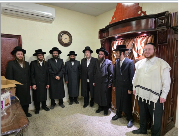 Avrohom Dinkel With Blum and Greenhut - After Photo Changed Clothing.png